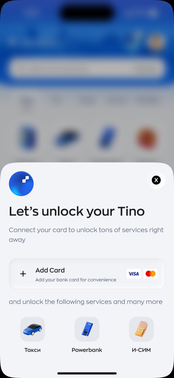 A sheet reading let's unlock your Tino. Connect your card to unlock tons of services right away, an add card row with Visa and Mastercard logos, then three service icons for taxi, powerbank and eSIM under a line about unlocking the following services.